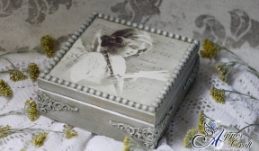 Wooden box with angel and mouldings